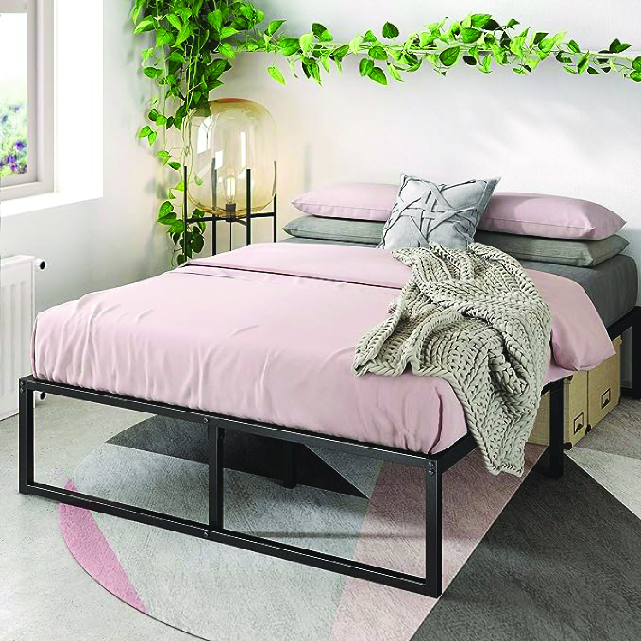 Minimalist metal platform bed frame with sleek design and sturdy construction.